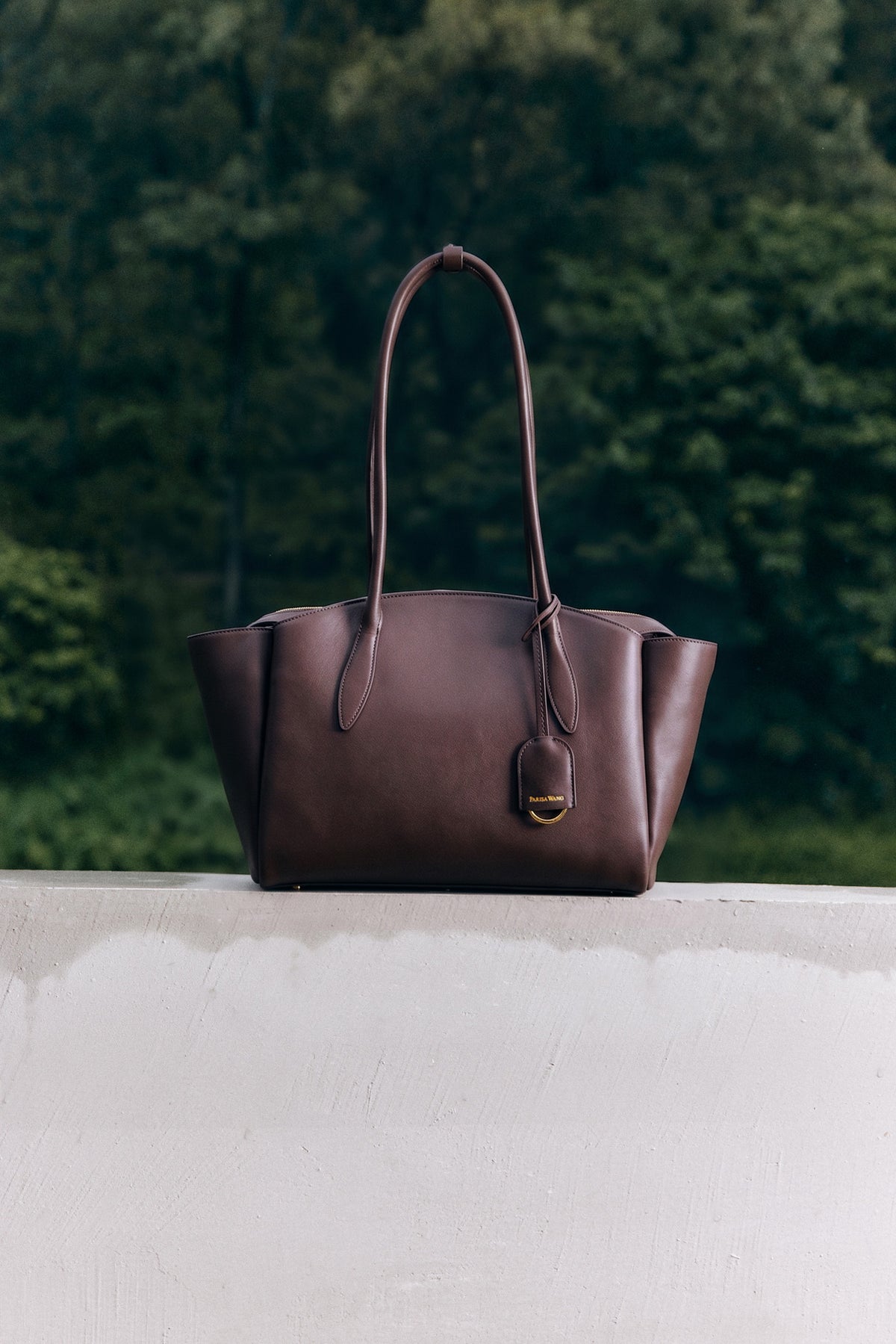 Chocolate Gabrielle East-West Tote with long shoulder handles.